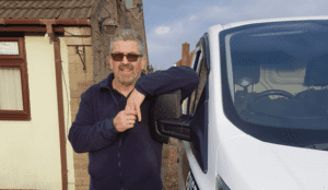 cropped picture of andy with his van